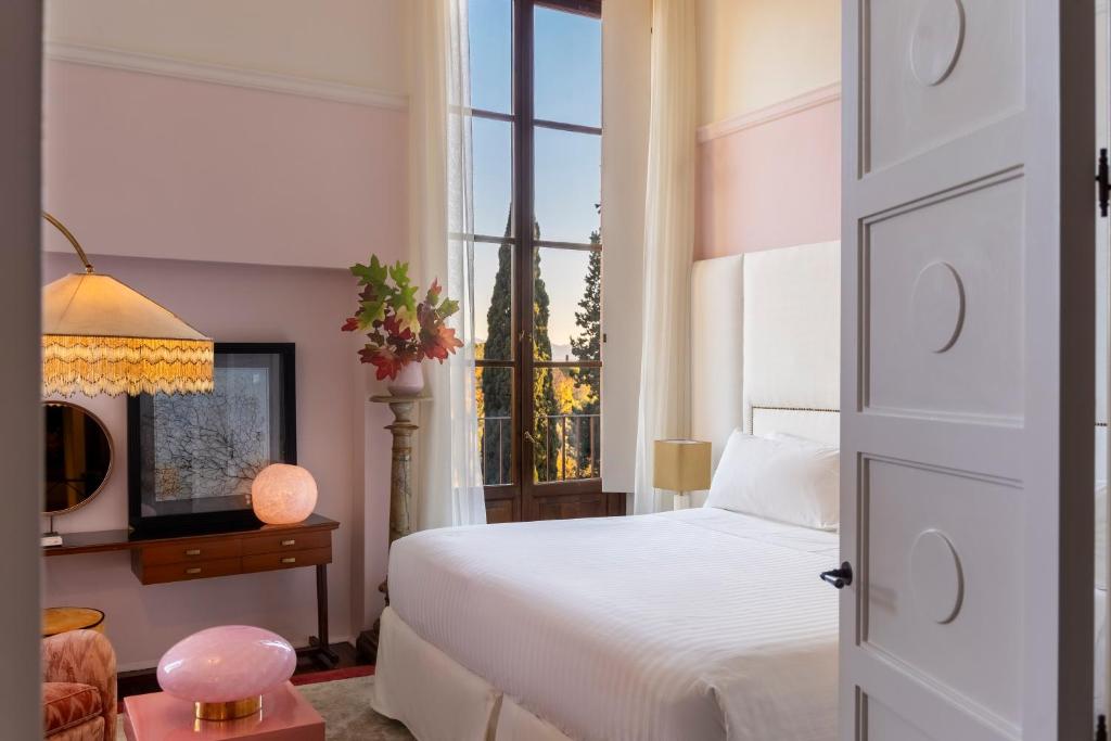 Postel nebo postele na pokoji v ubytování Il Salviatino Firenze