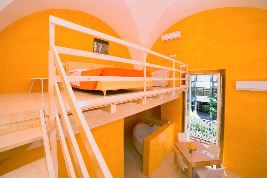 Poschodová posteľ alebo postele v izbe v ubytovaní Relais Carlo V - Palazzo Storico