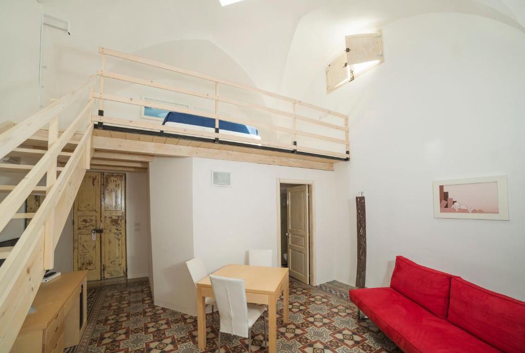 Posteľ alebo postele v izbe v ubytovaní Relais Carlo V - Palazzo Storico