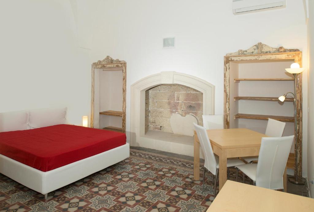 Posteľ alebo postele v izbe v ubytovaní Relais Carlo V - Palazzo Storico