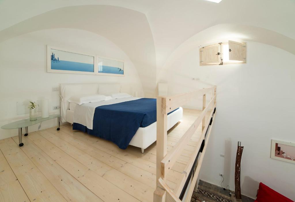Posteľ alebo postele v izbe v ubytovaní Relais Carlo V - Palazzo Storico