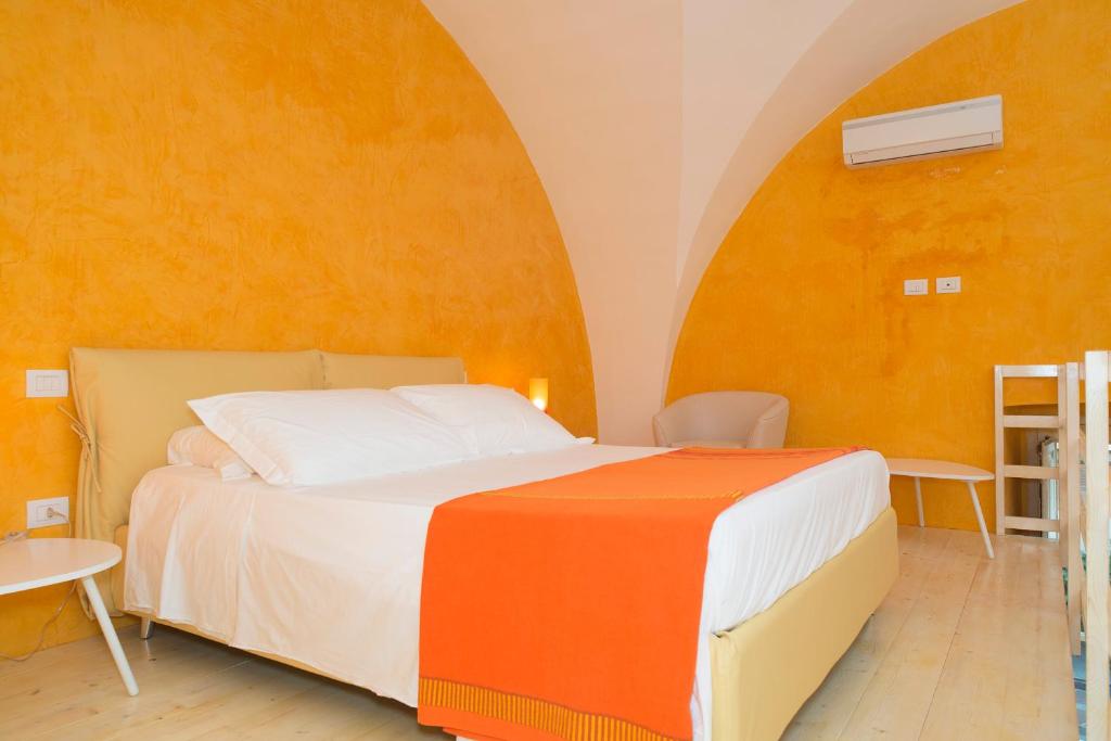 Posteľ alebo postele v izbe v ubytovaní Relais Carlo V - Palazzo Storico