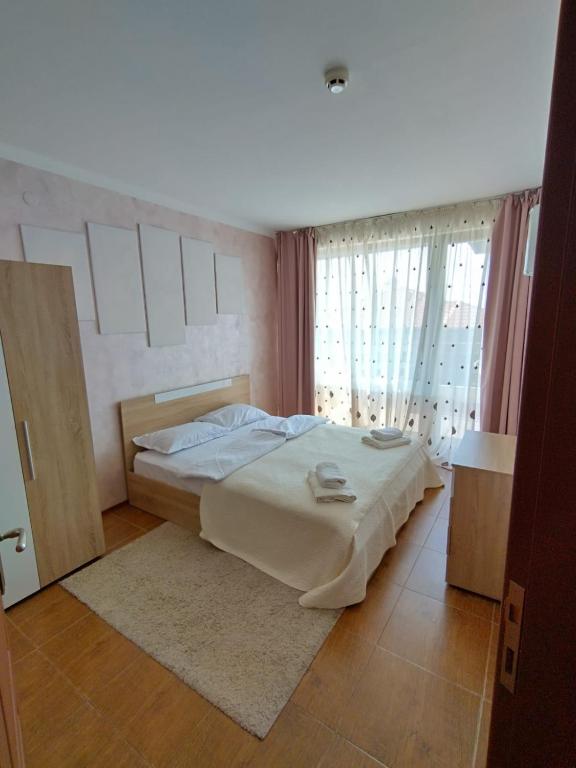 Postel nebo postele na pokoji v ubytování Bay View Villas apartment NONA 1C - Kosharitsa