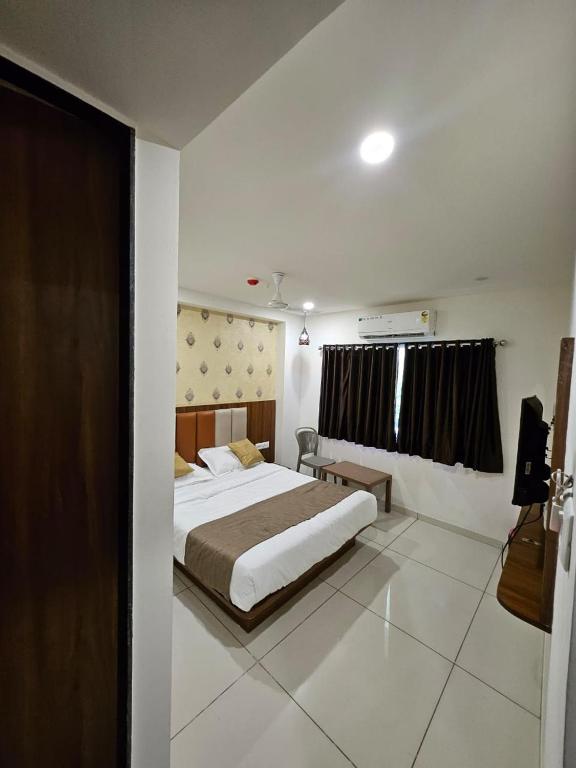 Postel nebo postele na pokoji v ubytování hotel leo