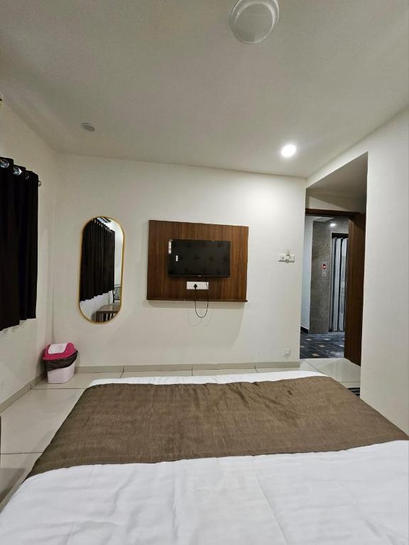 Postel nebo postele na pokoji v ubytování hotel leo