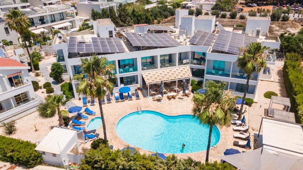 an aerial view of a resort with a swimming pool at Bellini Hotel in Ayia Napa