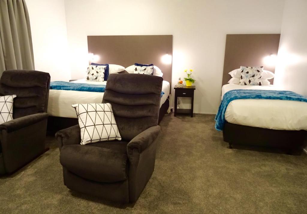 Postel nebo postele na pokoji v ubytování BKs Premier Motel Hamilton