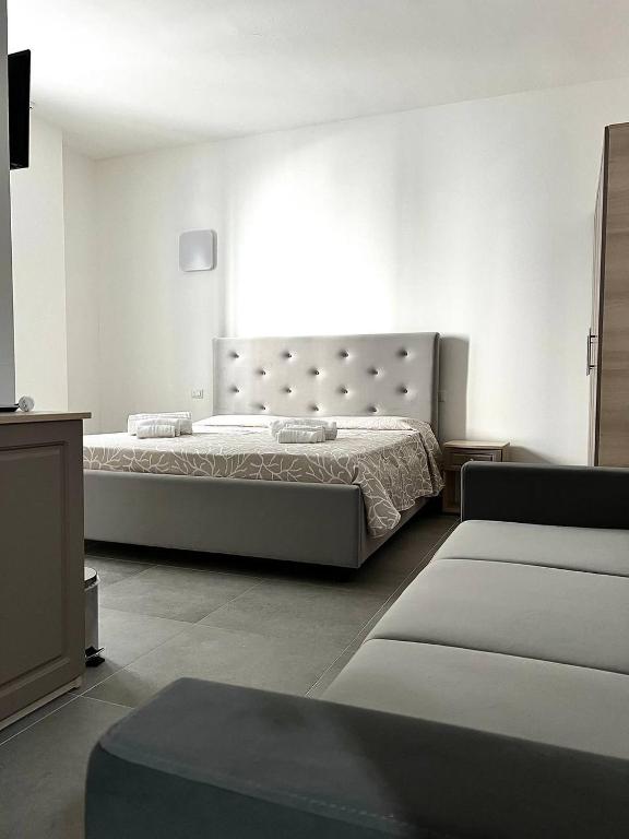 Postel nebo postele na pokoji v ubytování Hotel Marechiaro - Direttamente sul mare
