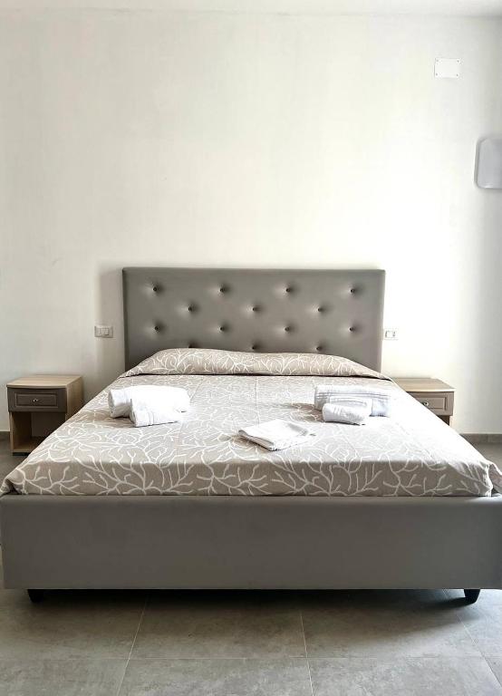 Postel nebo postele na pokoji v ubytování Hotel Marechiaro - Direttamente sul mare
