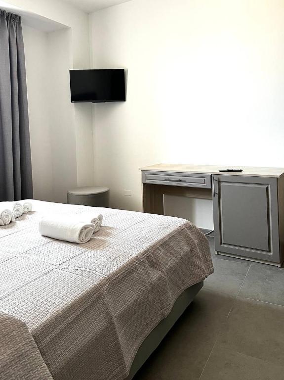 Postel nebo postele na pokoji v ubytování Hotel Marechiaro - Direttamente sul mare