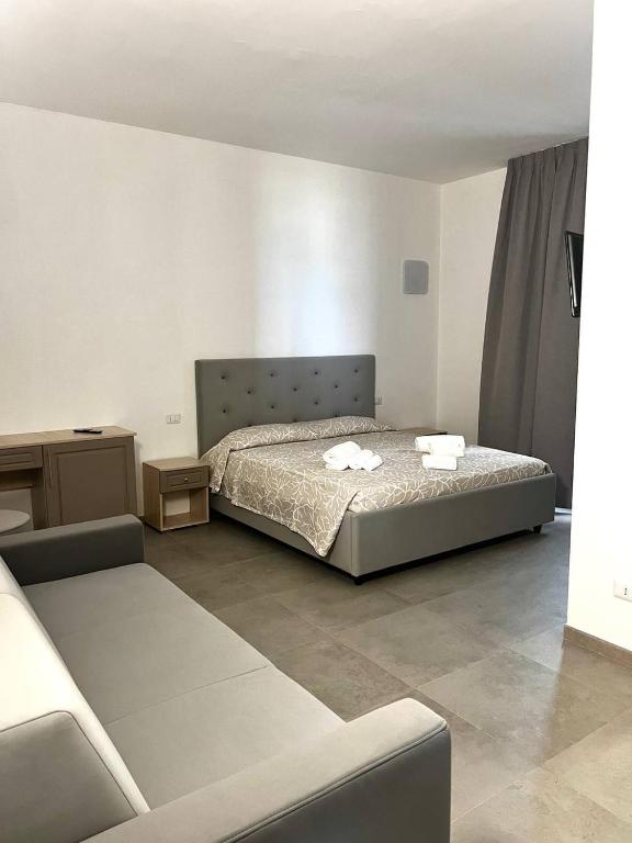 Postel nebo postele na pokoji v ubytování Hotel Marechiaro - Direttamente sul mare