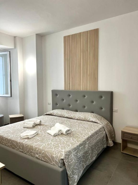 Postel nebo postele na pokoji v ubytování Hotel Marechiaro - Direttamente sul mare