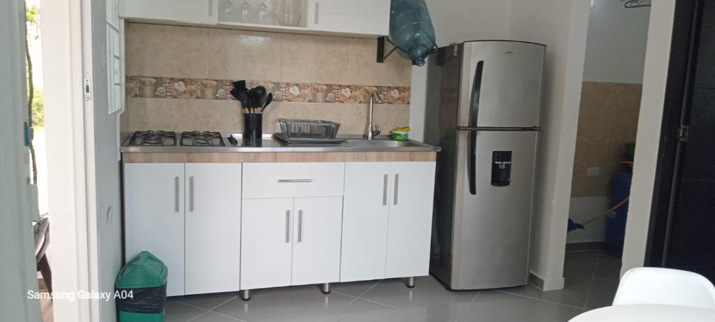 Kuchyň nebo kuchyňský kout v ubytování Cabaña Los Cristales Coveñas