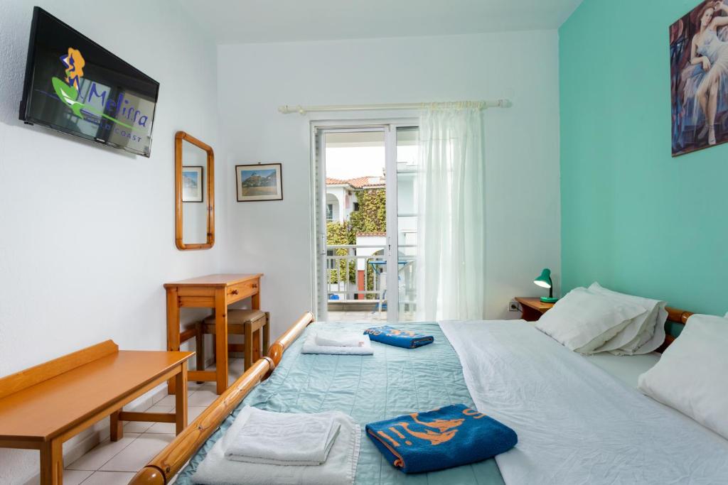 Postel nebo postele na pokoji v ubytování Melissa Gold Coast
