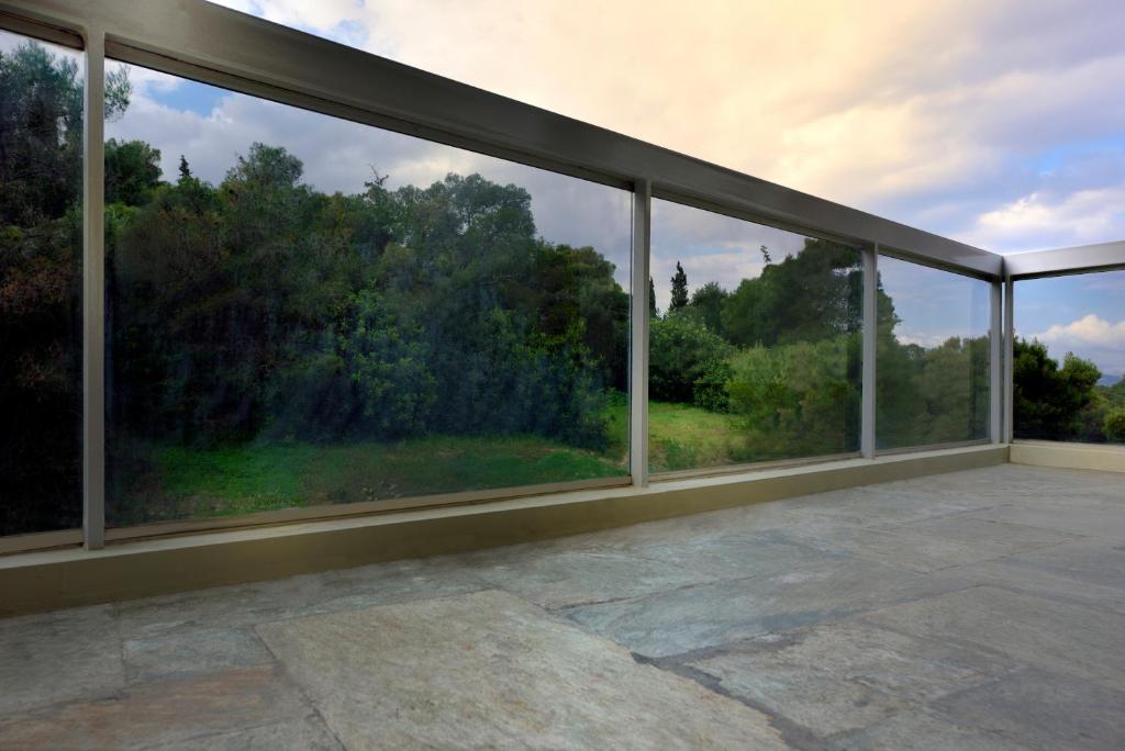 Balkón alebo terasa v ubytovaní KARYATIS LUXURY MAISONETTE by K&K