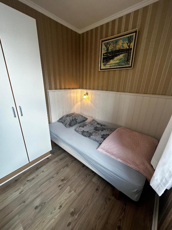 Postel nebo postele na pokoji v ubytování Oasen