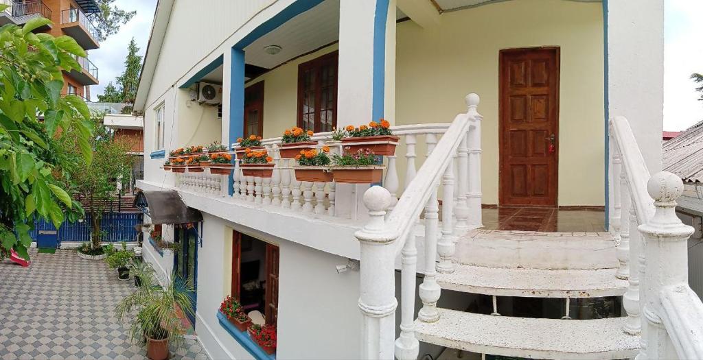 Balkón nebo terasa v ubytování Guest house on Devyatnadtsataya