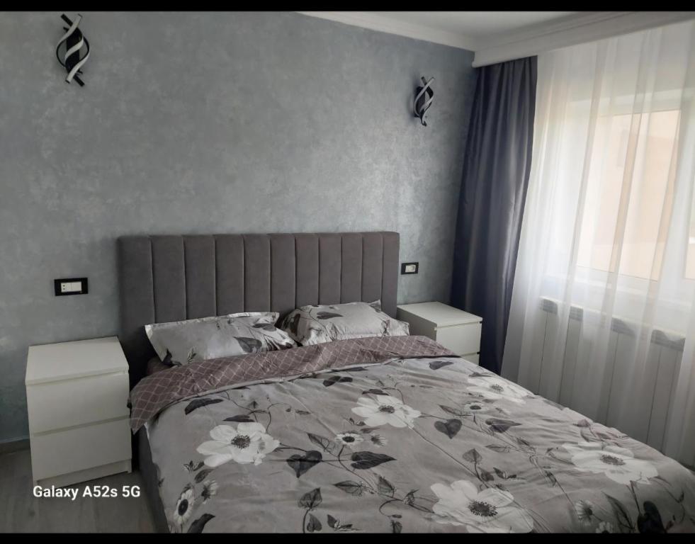 Ένα ή περισσότερα κρεβάτια σε δωμάτιο στο Isabell Apartaments