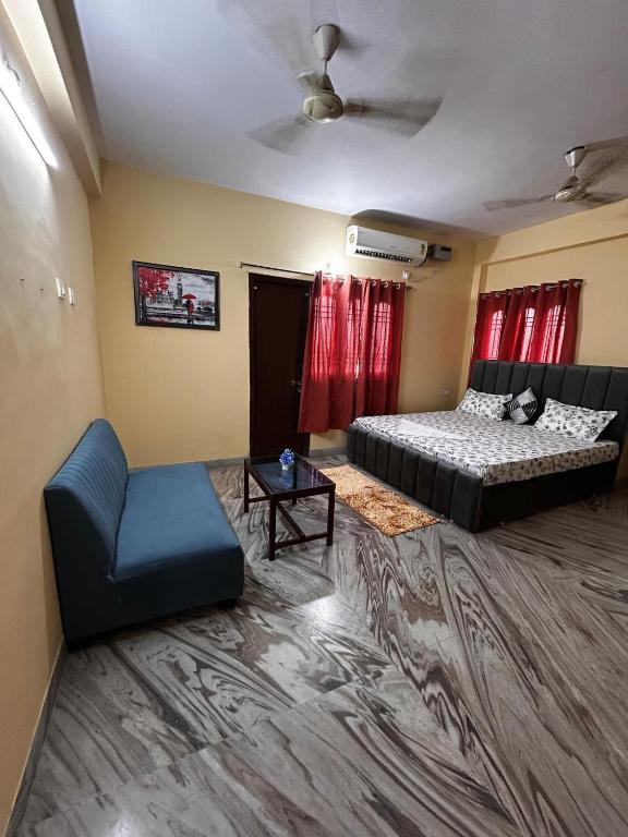 Postel nebo postele na pokoji v ubytování Bihar stay properties