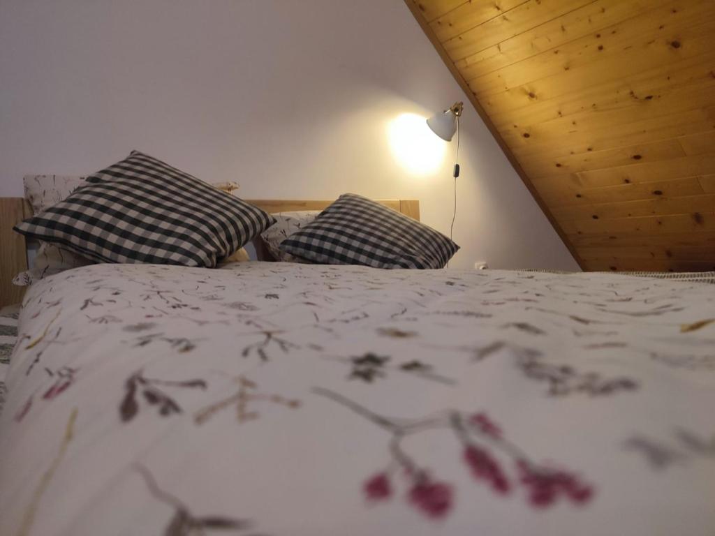 Postel nebo postele na pokoji v ubytování Vijogor kod Plavog