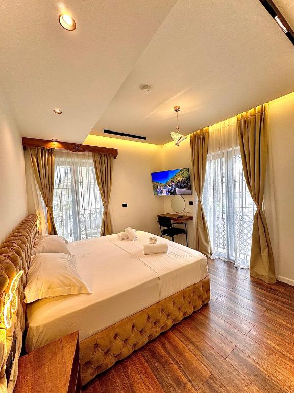 Postel nebo postele na pokoji v ubytování Martin Luxury Hotel