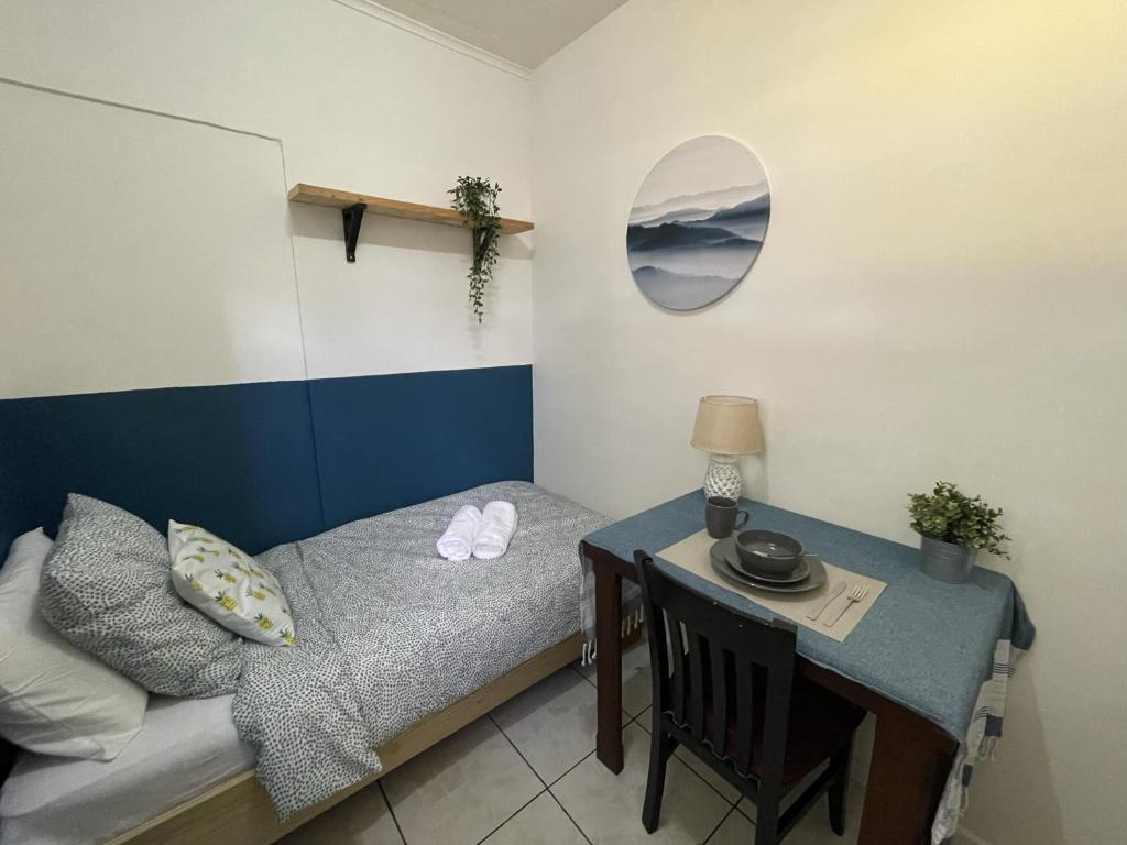 Postel nebo postele na pokoji v ubytování Simple Rooms at Casa Caïa