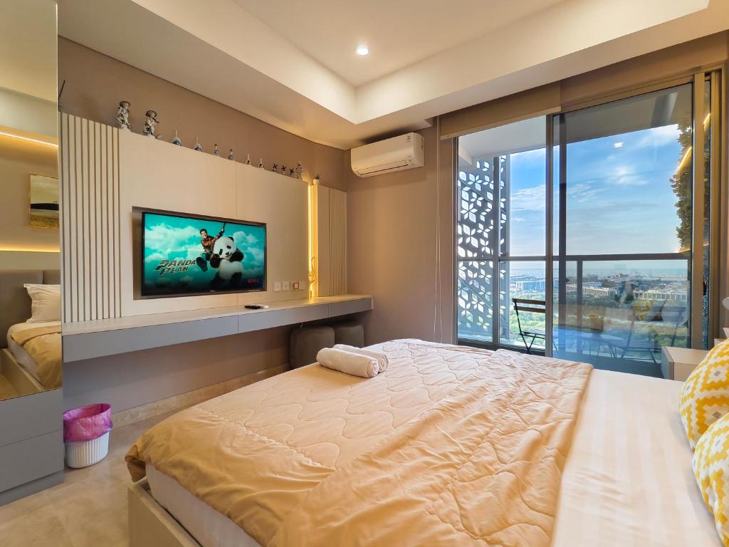 Studio Sea View Apartment at Gold Coast PIK by MYsweethome - 9