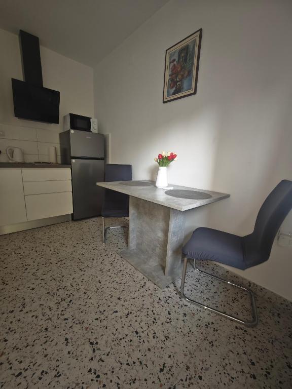 Kuchyňa alebo kuchynka v ubytovaní Apartment Neven