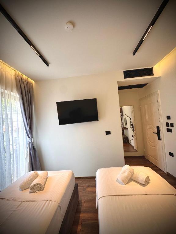 Postel nebo postele na pokoji v ubytování Martin Luxury Hotel