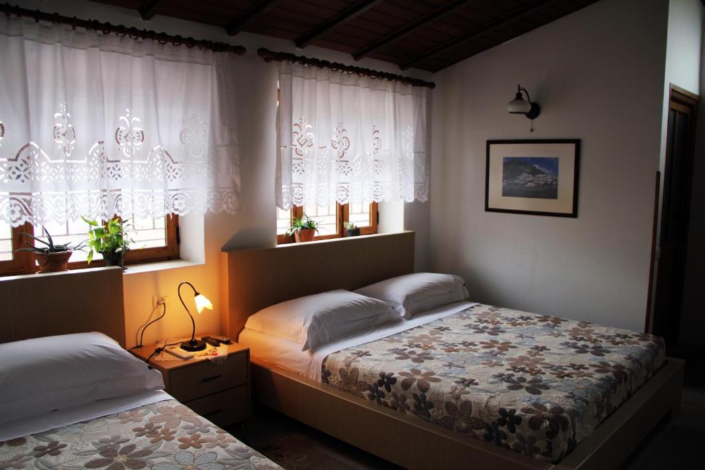 Llit o llits en una habitació de Hotel Boutique Osumi
