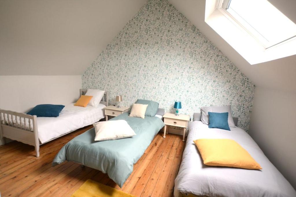 Les Suites Fisel - Chambre Triple Classique