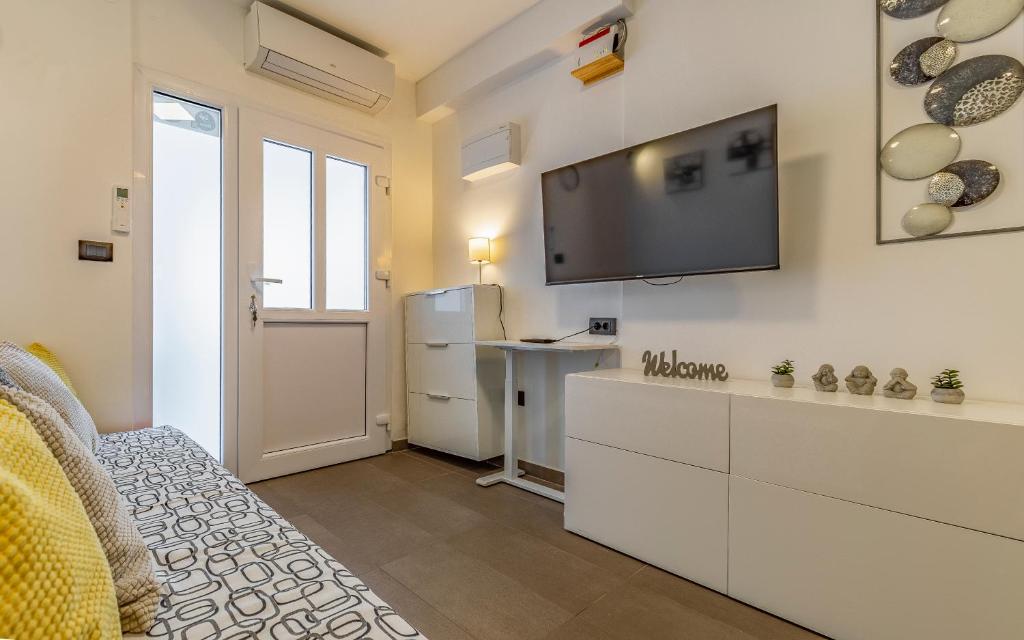 Televízia a/alebo spoločenská miestnosť v ubytovaní Apartment Mar