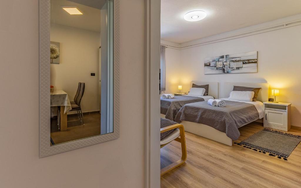 Posteľ alebo postele v izbe v ubytovaní Apartment Mar