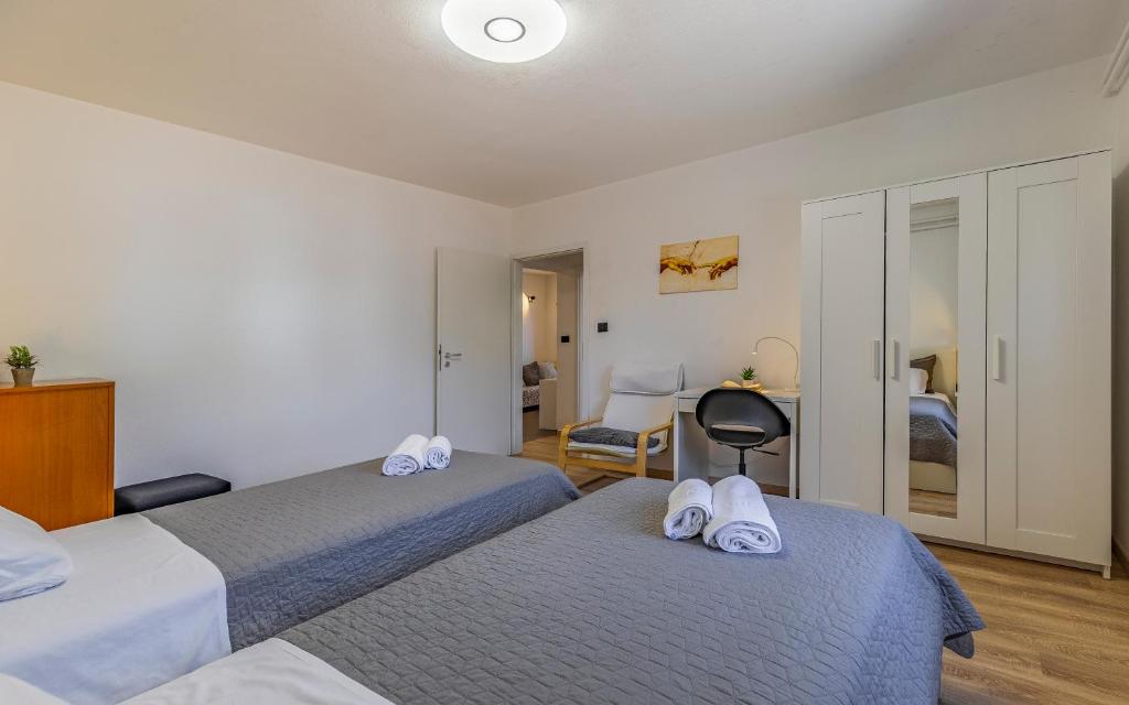 Posteľ alebo postele v izbe v ubytovaní Apartment Mar