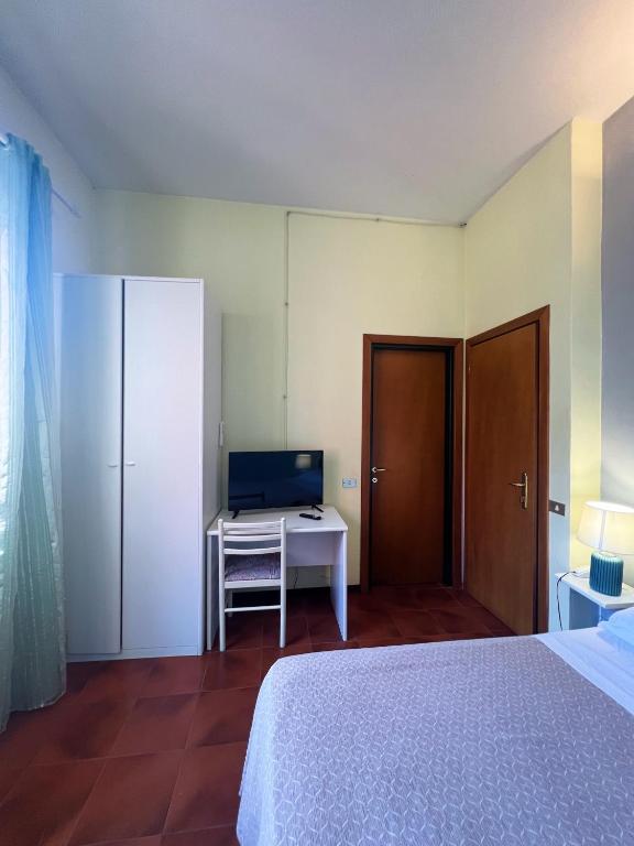 Letto o letti in una camera di Hotel Le Grazie