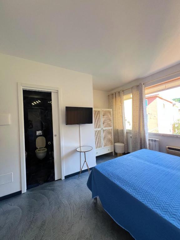 Letto o letti in una camera di Hotel Le Grazie