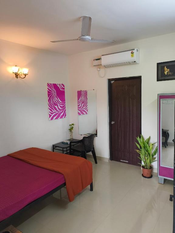 Postel nebo postele na pokoji v ubytování Coconut Inn - Parra Goa