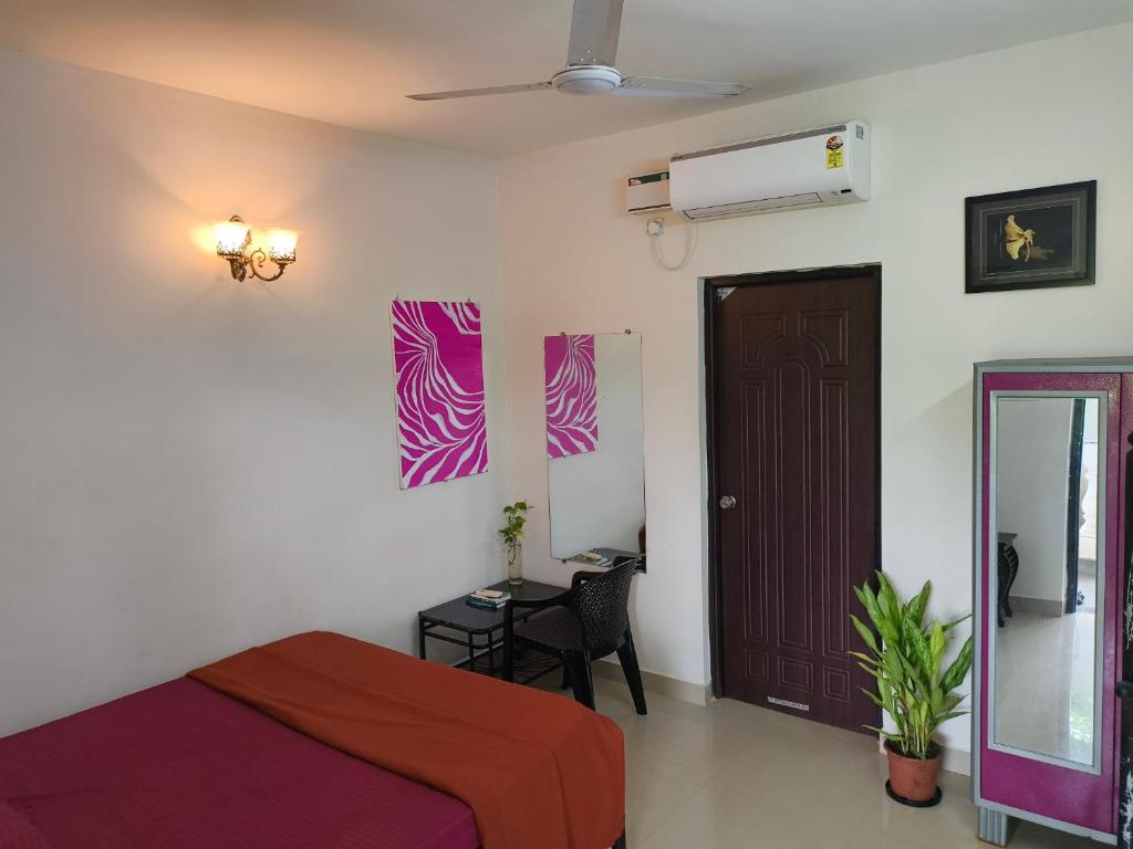 Postel nebo postele na pokoji v ubytování Coconut Inn - Parra Goa