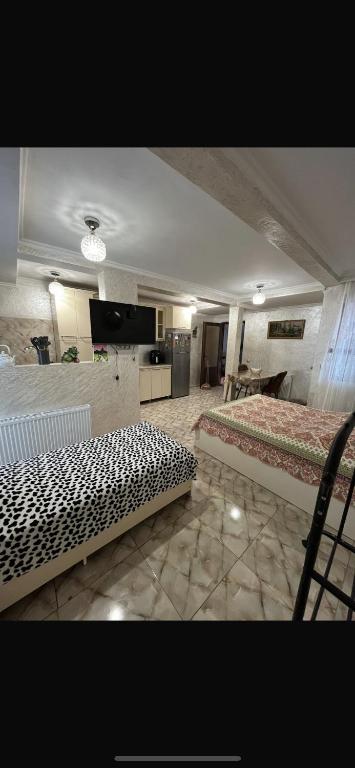 Postel nebo postele na pokoji v ubytování FIROSMANI house