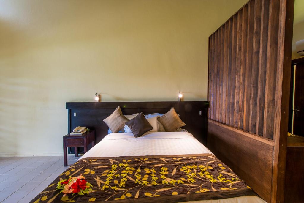 Postel nebo postele na pokoji v ubytování Mana Island Resort & Spa - Fiji