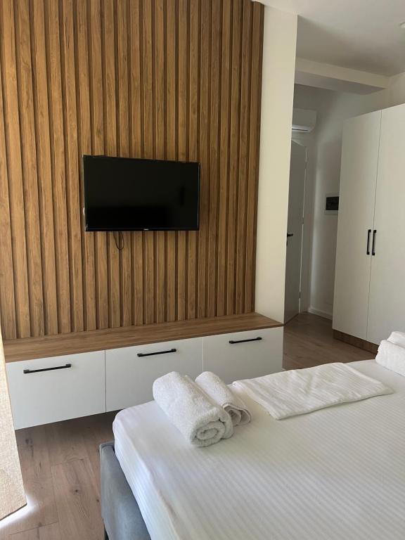 Postel nebo postele na pokoji v ubytování Vlora Sunset Rooms