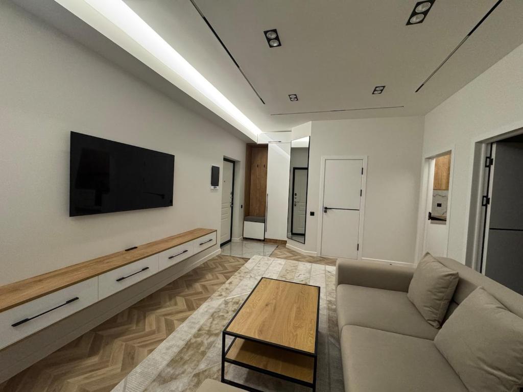 TV a/nebo společenská místnost v ubytování HomeSweet