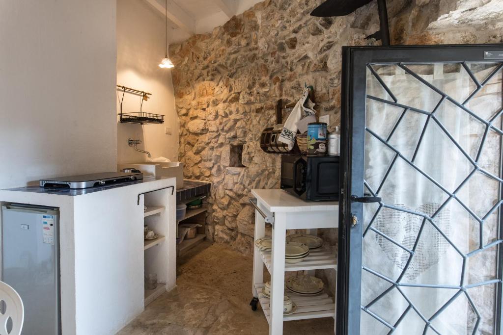 Kuchyň nebo kuchyňský kout v ubytování Feudo - Pajara Curte 3 by Salento Prime