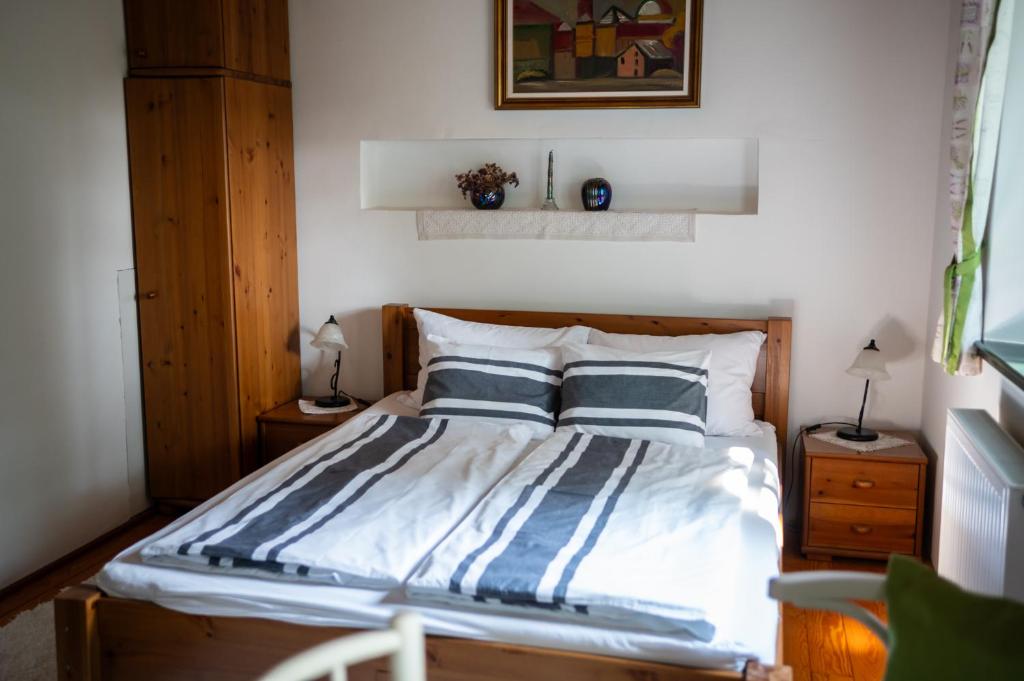 Postel nebo postele na pokoji v ubytování Guest House Vidravar