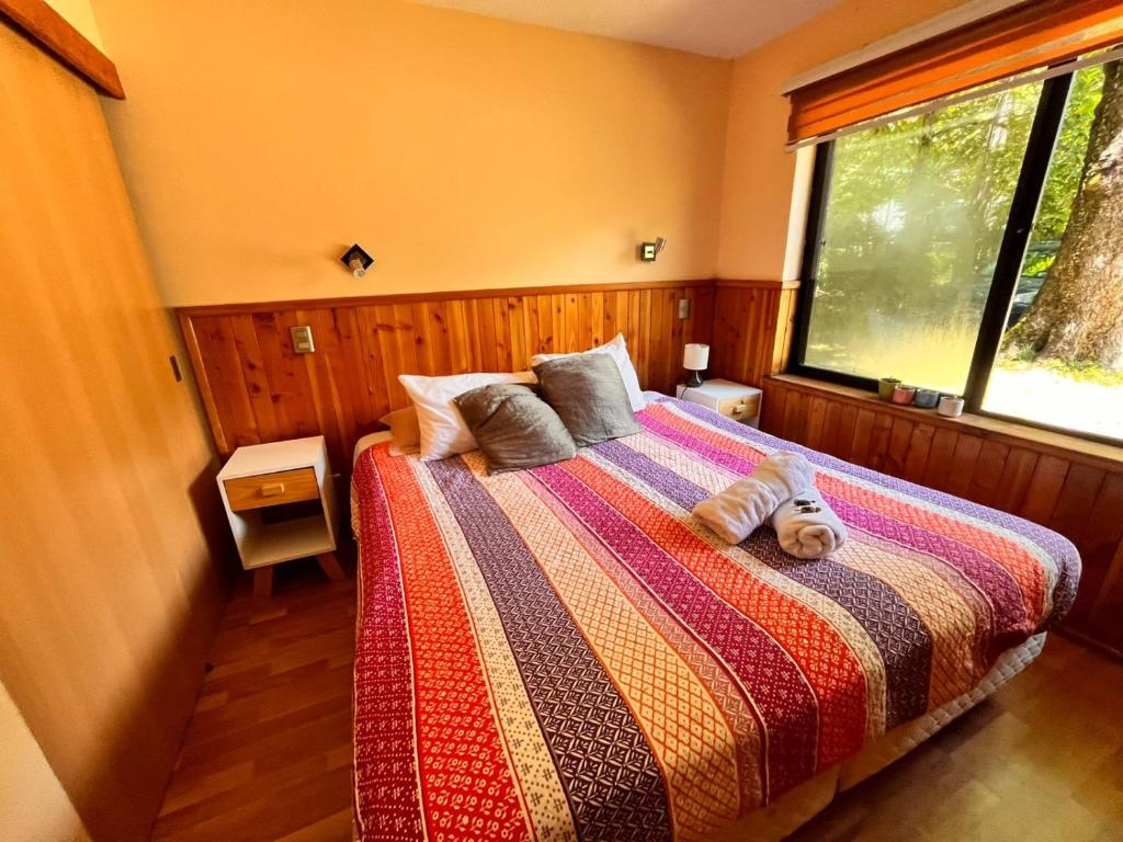 Postel nebo postele na pokoji v ubytování Bosque Volcánico