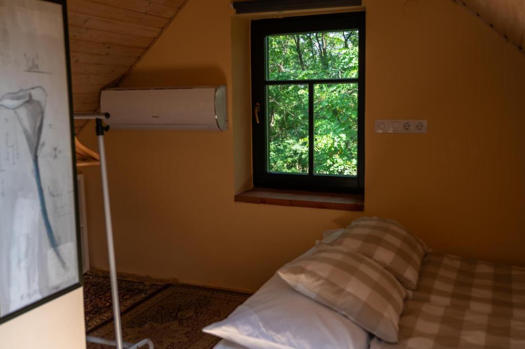 Postel nebo postele na pokoji v ubytování Guest House Vidravar