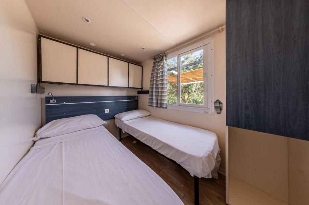 Letto o letti in una camera di Agriturismo l' Annunziata
