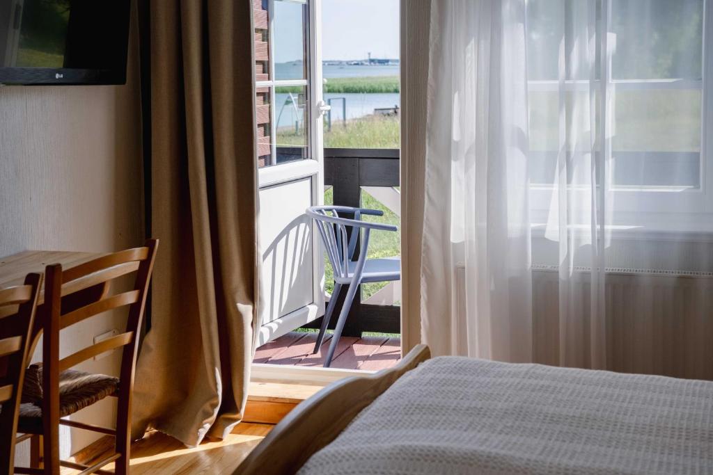 Postel nebo postele na pokoji v ubytování Prie Mariu