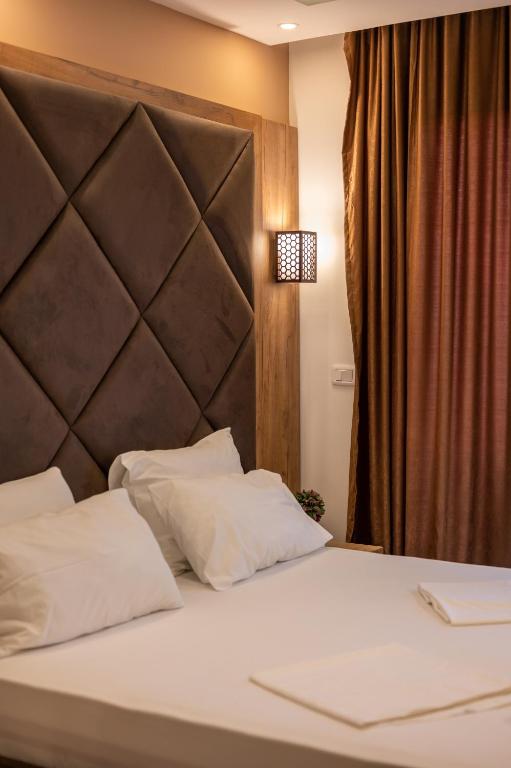 Postel nebo postele na pokoji v ubytování Hotel Evropa
