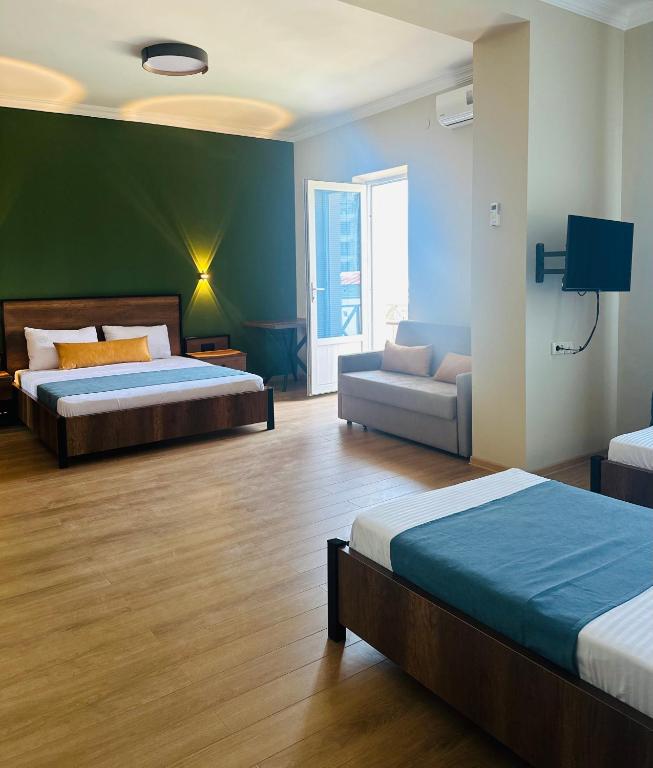 Postel nebo postele na pokoji v ubytování Hotel albatros shekvetili